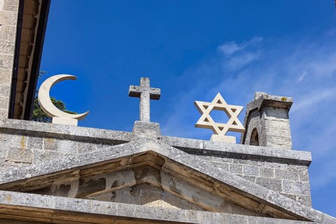 Cross of Christianity, crescent of Islam, Star of David of Judaism, Cappella Nuova historic