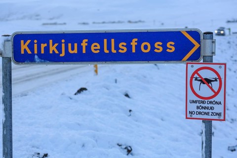No drone sign at a tourist attraction, winter, Kirkjufellsfoss, Iceland, Europe