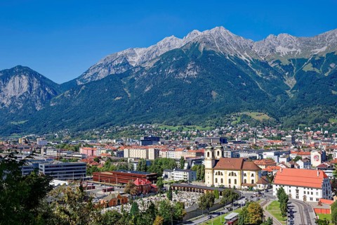 View of Innsbruck with the parish church and basilica Mariae Empfängnis, Wilten cemetery and the