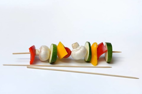 Colourful vegetable skewers and barbecue skewers