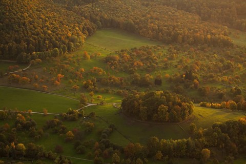 Volcanic embryo Hohbölle near Beuren. Autumnal Swabian Alb at sunset