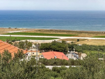 View from military cemetery hill height 107 near Maleme on runway landing strip from today small