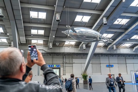 Mechanical flying objects, filled with helium, controlled by fine mechanics, movements copied from