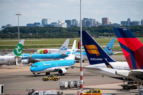 Amsterdam Schiphol Airport, aircraft at the terminal, Gates D, check-in, apron, skyline of