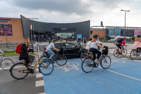 Cyclists on cycle paths, at the shopping centre Fisketorvet, Sydhavnen, in the city centre of