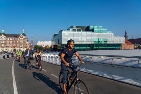 Cyclists on the Lille Langebro cycle and pedestrian bridge over the harbour, Copenhagen is