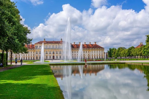 Garden parterre with fountain in front of the New Palace in the Schleissheim Palace complex,