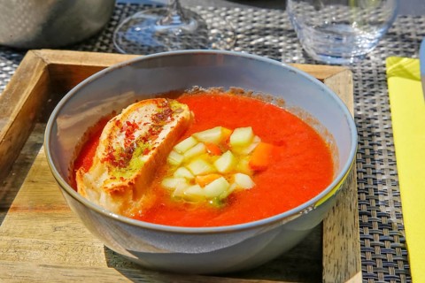 Gazpacho, Spanish vegetable soup, with red pepper, cucumber, toasted white bread, soup bowl, Hotel