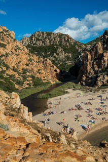 Red rocks and picturesque beach, Spiaggia di Cala li Cossi, Costa Paradiso, Sardinia, Italy, Europe