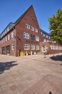 Post office against a cloudless blue sky in Bad Salzuflen, Lippe district, North Rhine-Westphalia,