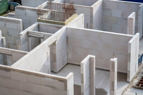 Building site, shell construction, walls of a residential building are finished, lift shaft