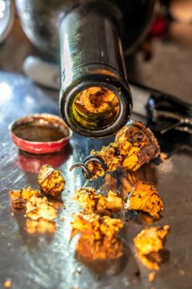 Wine cork, extracted from old, overaged wine bottles, partly crumbly, softened, rotten