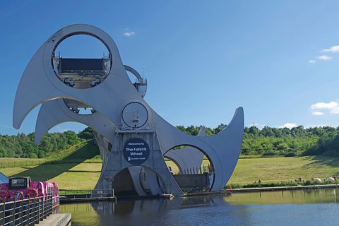 The Falkirk Wheel, a hydraulic structure, moves boats between two canals at different levels, Forth
