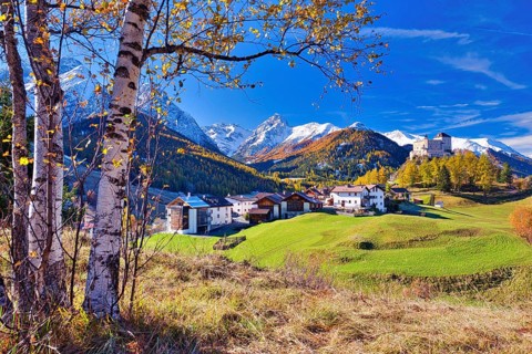 Village view of Tarasp with castle in autumn, Scuol, Canton Graubünden, Switzerland, Europe