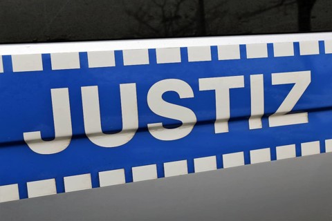 Justice lettering on the emergency vehicle of the German judicial authority