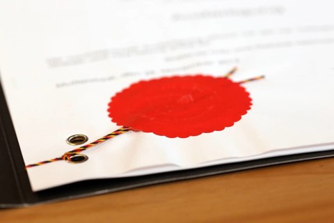 Notarised contract with red official seal