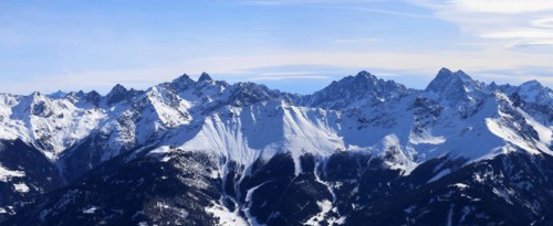 Alpine panorama with snow-covered mountain peaks in winter. Taken in the ski resort of Serfaus Fiss