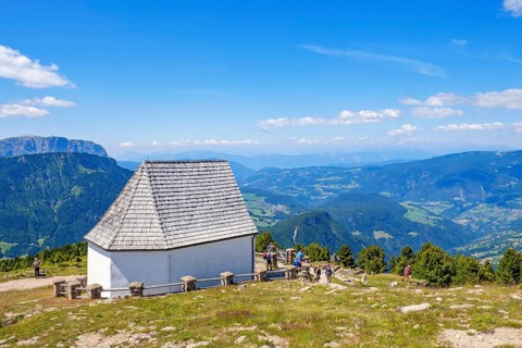 View at the dolomites alps with The Holy Cross Chapel on Rasciesa mountains, Ortisei, Val Gardena,