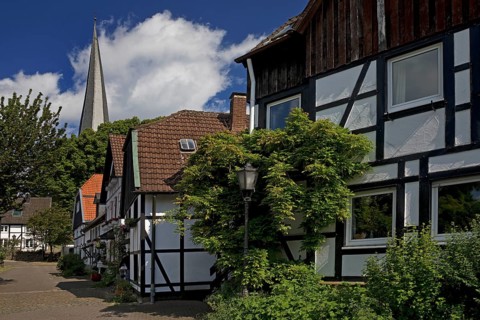 The old town centre with half-timbered houses and the church tower of Sankt Viktor, Schwerte, Ruhr