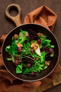 Fresh salad, waldorf, celery stalk, with apple and walnut, grapes, herbs, homemade, no people