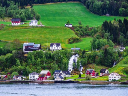 Mountains and Fiord over Norwegian Village in Olden, Innvikfjorden, Norway, Europe