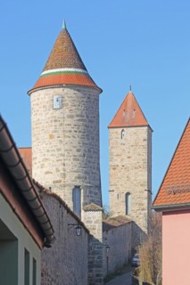 Round jug defence tower with historic town wall and square Hertelsturm, town fortification,