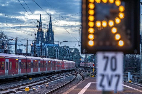 Local train on the line in front of Cologne Central Station, Hohenzollern Bridge, Cologne
