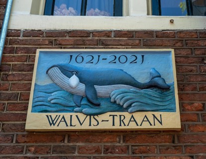 400 year old house, Walvis-Traan, on a canal in Amsterdam, Netherlands