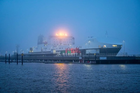 Thick fog in winter, hangs over the mouth of the Elbe into the North Sea, DFDS ferry viewpoint Alte