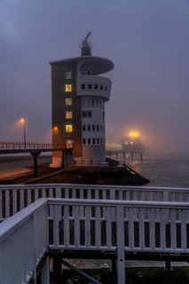 Thick fog in winter, hanging over the mouth of the Elbe into the North Sea, radar tower of the
