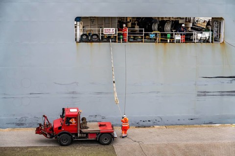 North lock in the overseas harbour of Bremerhaven, the vehicle transporter Durban Highway, under