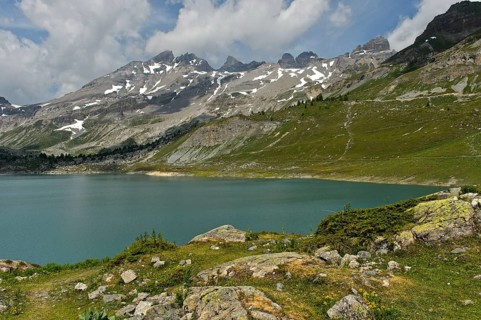 The Dents du Midi mountain range with the Haute Cime peak, left, above the mountain lake Salanfe,