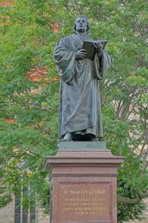 Sculpture Martin Luther monument, Luther monument with inscription Psalm 118, 17, Bible verse,