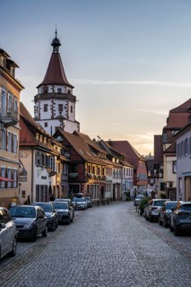 The main street with the Niggelturm tower in the historic old town of Gengenbach, Ortenaukreis,