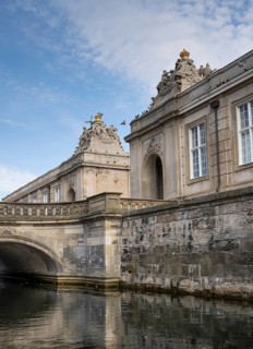 Marble bridge and entrance to the riding arena and Christiansborg Palace, Danish Parliament,