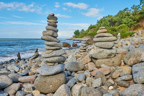 Nature landscape of stones on a beach between Cairns and Port Douglas in spring, Australia, Oceania