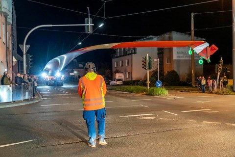 Transport of a 68 metre long, 22 tonne blade of a wind turbine, here in Schwelm, with a