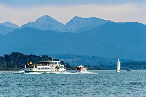 Excursion boat, passenger ship MS Josef, speedboat of the water rescue service overtakes in fast