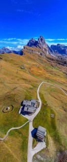 The Sofie hut, behind it the peaks Sas Rigais and Furchetta of the Geisler group, panoramic photo,
