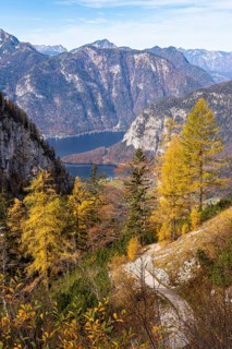 View from the slopes of the Dachstein mountains to the hiking trail to the ice cave. Lake Hallstatt