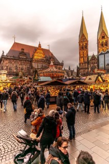 Christmas market at the historic town hall of the Hanseatic city of Bremen, market square in the