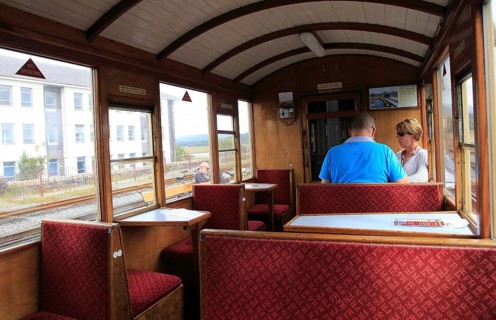 Passengers inside train carriage of Ffestiniog railway, Gwynedd, north west Wales, UK