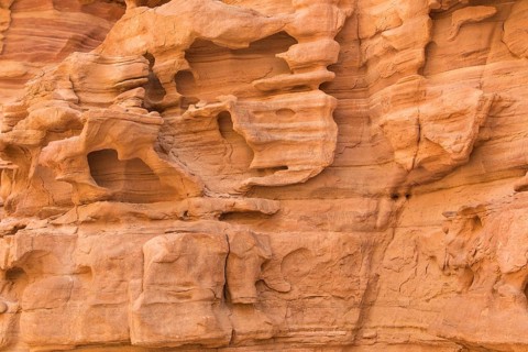 Natural texture of red rocks. Colored canyon, Egypt, desert, the Sinai Peninsula, Nuweiba, Dahab,