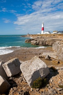 Red and white lighthouse on the coast at Portland Bill, Isle of Portland, Dorset, England, United