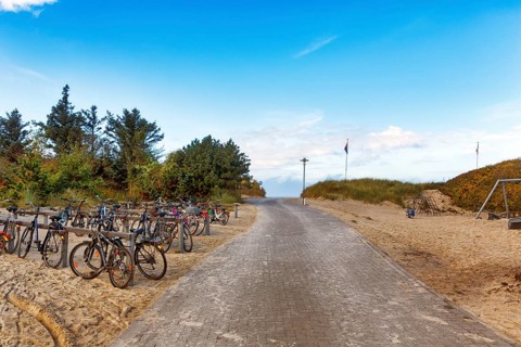 Beach access with parking for bicycles, autumn weather, Föhr Island, North Frisia, North Sea,