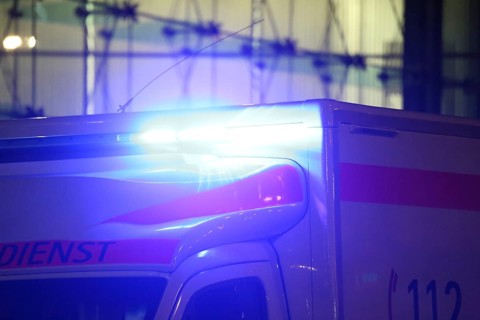 Close-up of a blue light on an ambulance at night (Berlin)