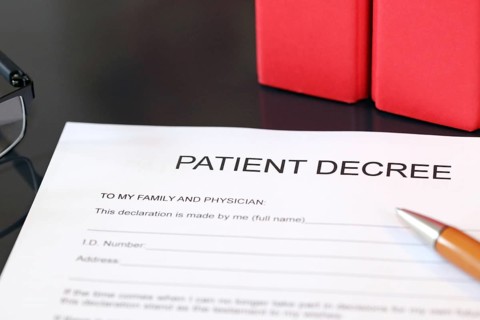 Symbolic image: Healthcare proxy, living will in English on a desk
