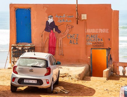 Sign for auberge tourist accomodation on beach, Legzira plage, southern Morocco, north Africa