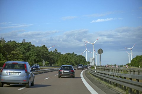 Wind turbines on the A 9 motorway, cloudy sky, Brandenburg, Germany, Europe