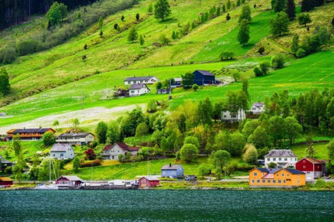 Mountains and Fjord over Norwegian Village, Olden, Innvikfjorden, Norway, Europe